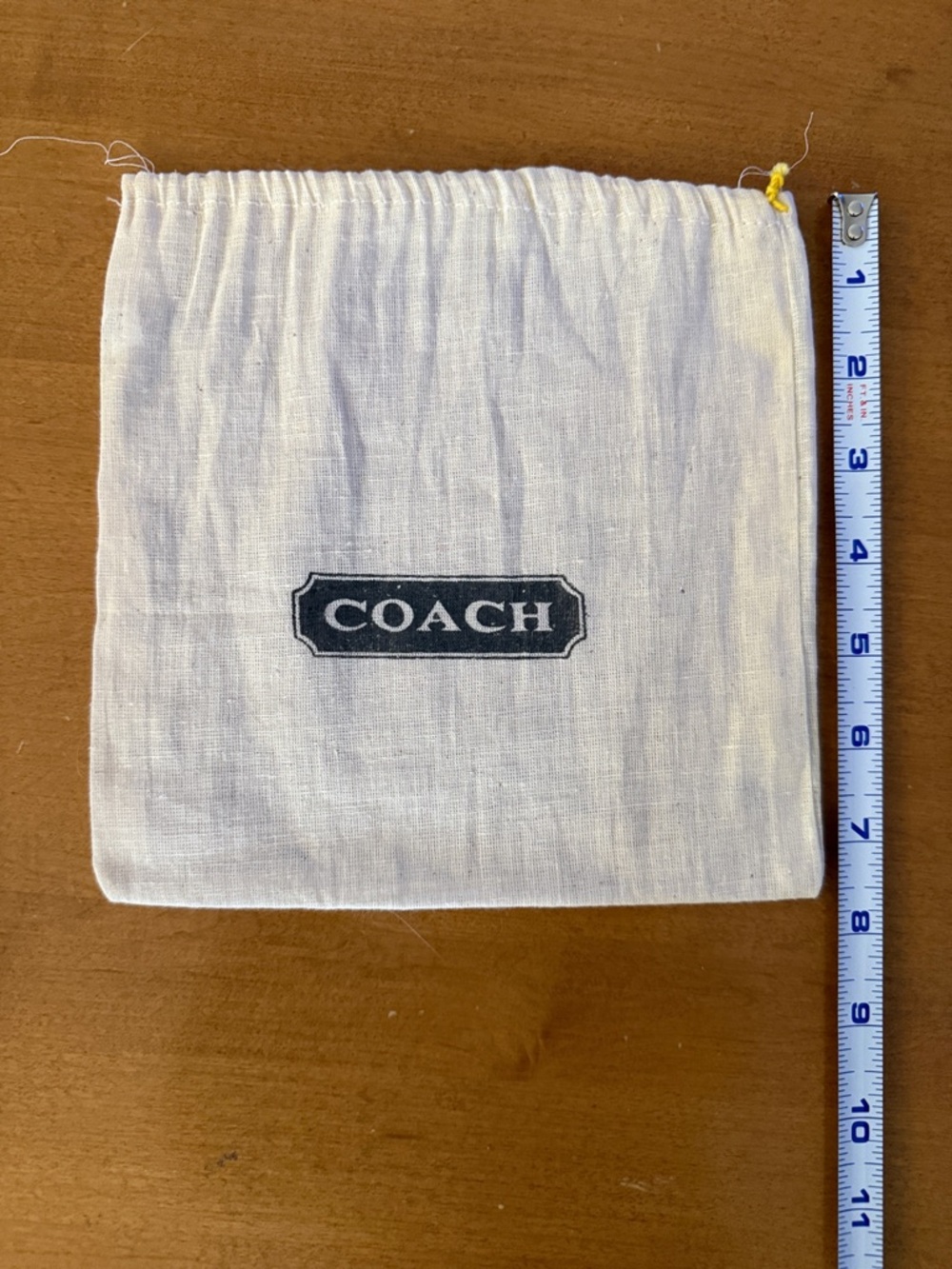 Coach Cream Drawstring Pouch with Black Logo